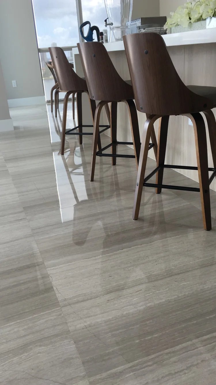 Custom bar and marble flooring installation — luxury interior remodeling by Kool Renovations Miami